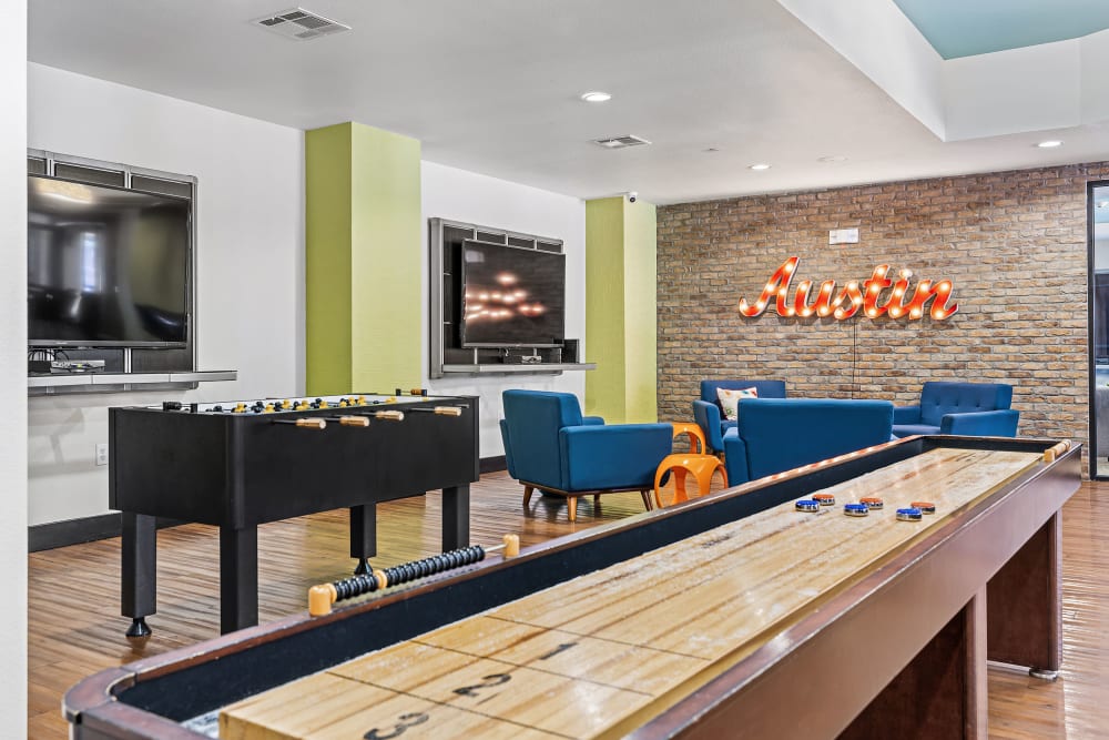 Recreation room with game tables at Regents West at 24th in Austin, Texas