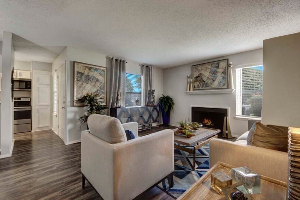 Enjoy Apartments with a Living Room and fireplace at The Fairways Apartment Homes 