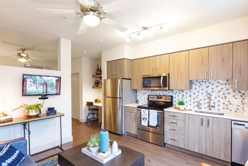 Stainless-steel appliances in a model apartment's kitchen at ArLo Apartments in Portland, Oregon