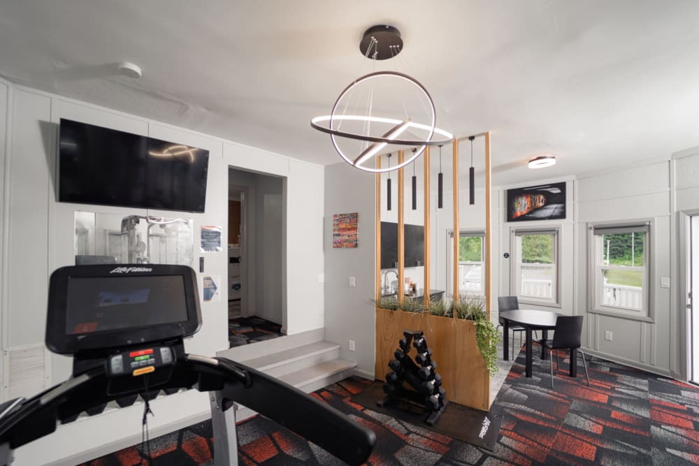 Fitness center with ample equipment at Woodbury Knoll in Woodbury, Connecticut