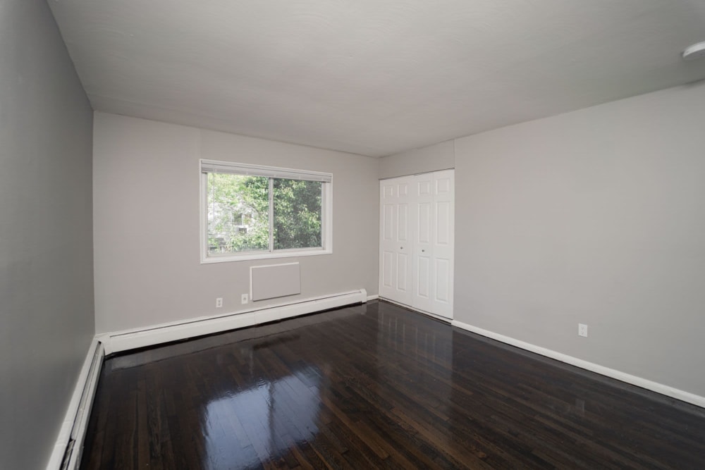 Bedroom with hardwood floors at Encore 99 in East Haven, Connecticut