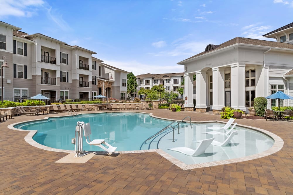 Beautiful swimming pool at The Addison at South Tryon | Apartments & Townhomes in Charlotte, North Carolina