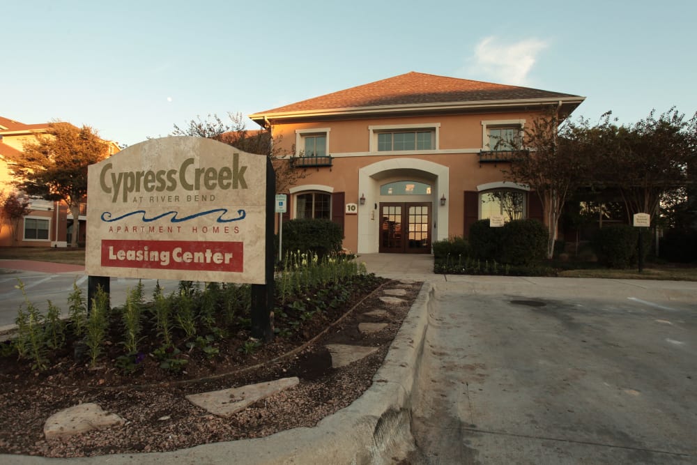 Community sign in front of the leasing office at Cypress Creek at River Bend in Georgetown, Texas