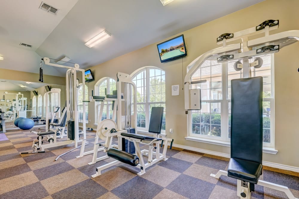Modern fitness center at River Walk Apartment Homes in Shreveport, Louisiana