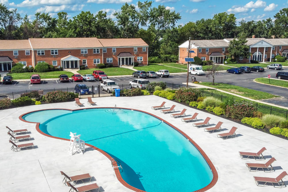 Sparkling pool with lounge chairs at Orchard Park, Edgewater Park, New Jersey
