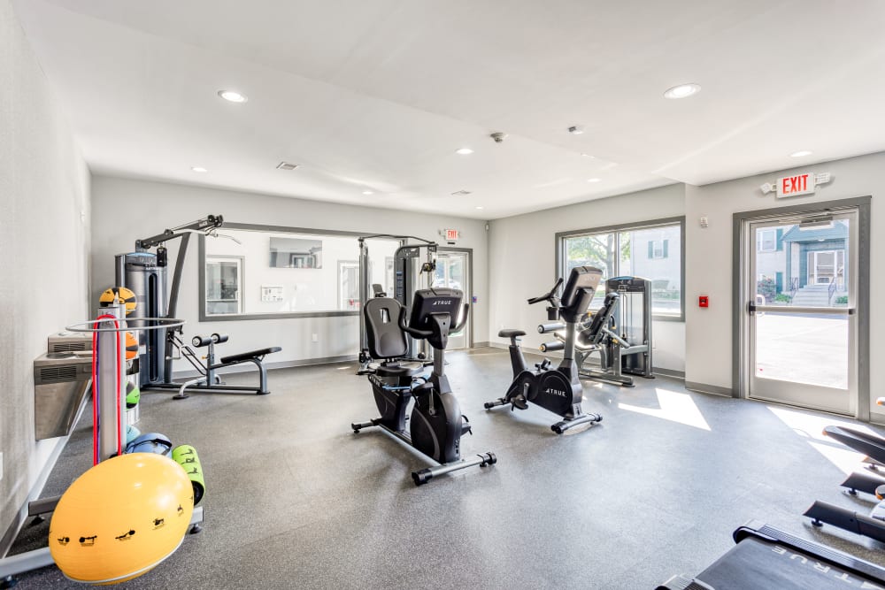 View of interior clubhouse gym at Harbor Club Apartments in Newark, Delaware
