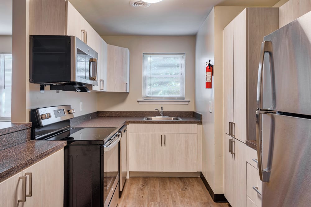 Kitchen view of apartment at Harbor Club Apartments in Newark, Delaware