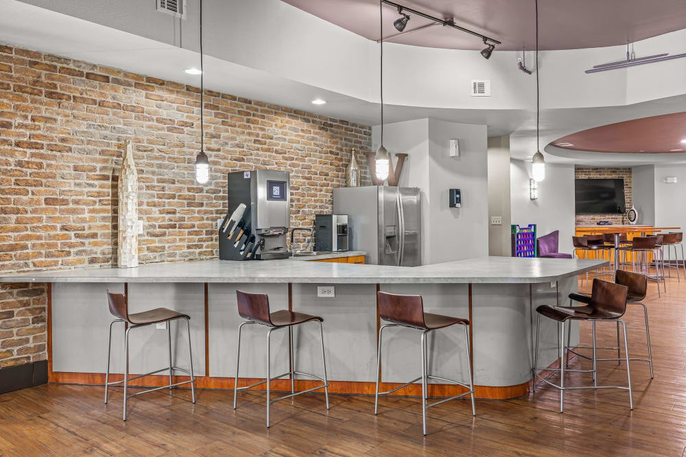 Community kitchen with stainless steel appliances at Regents West at 26th in Austin, Texas