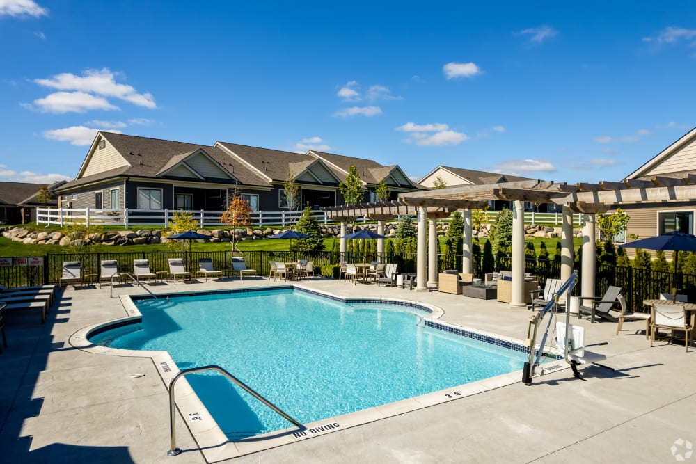 Swimming pool and sundeck at Encore at Deerhill in Clarkston, Michigan