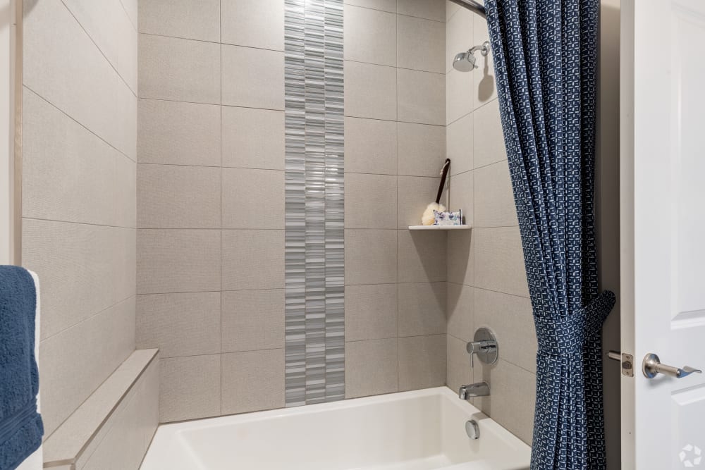 Granite shower and tub at Encore at Deerhill in Clarkston, Michigan