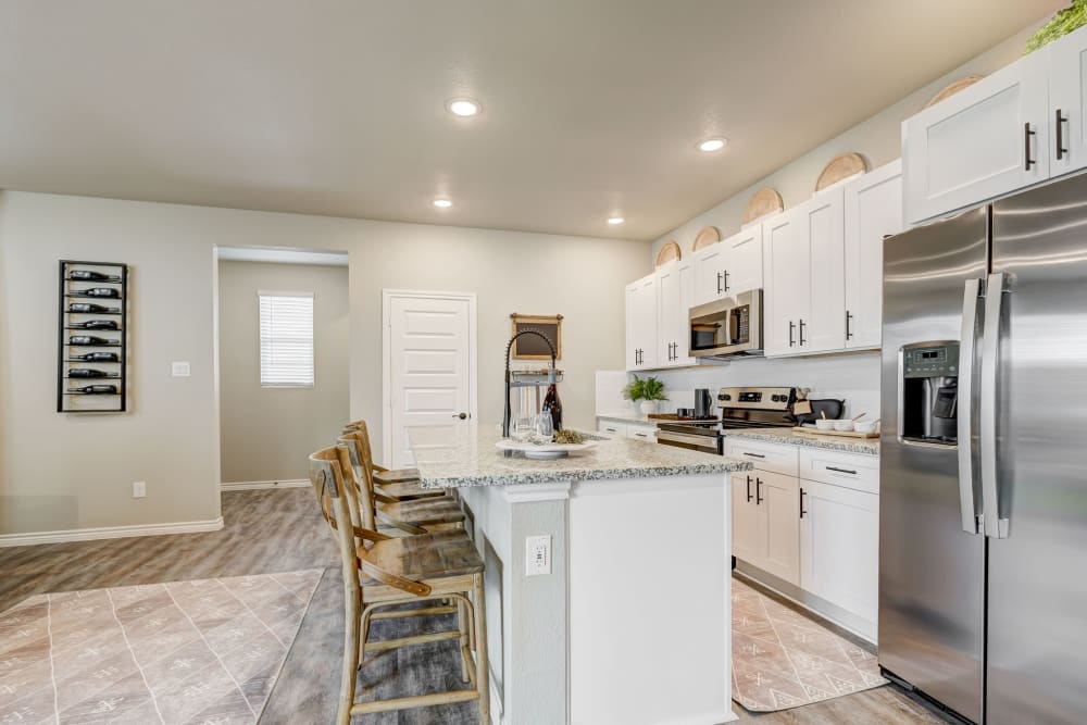 Large island in the kitchen for extra counter space at BB Living Harvest in Argyle, Texas