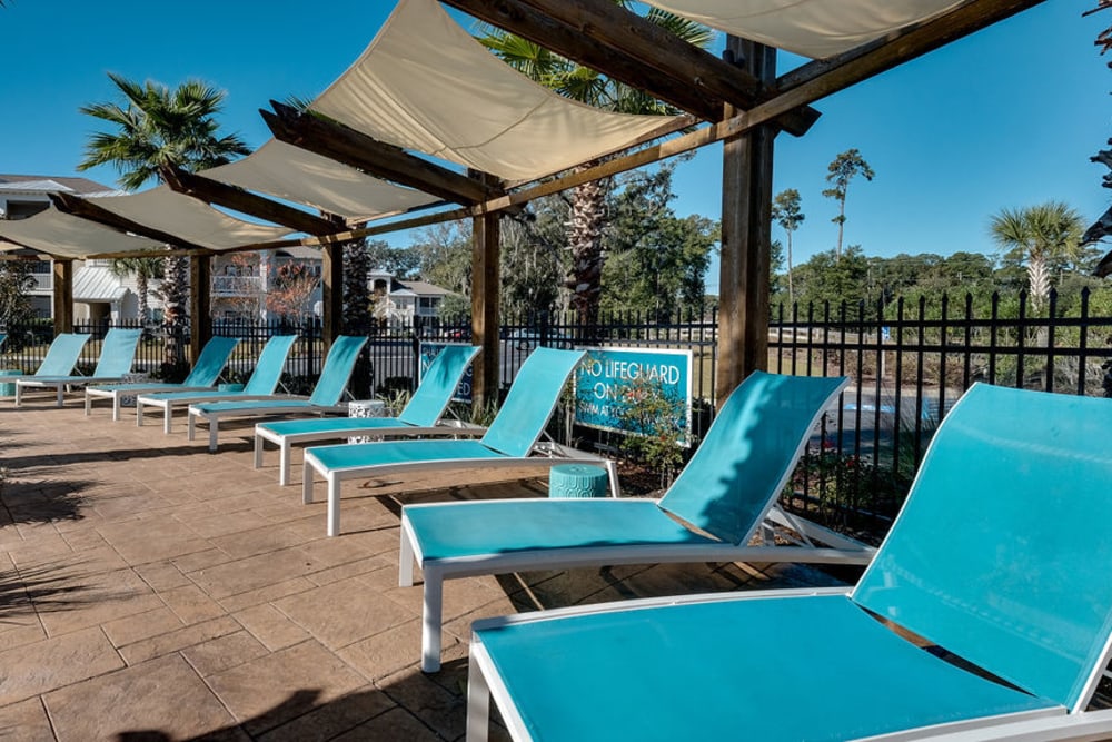 Pool-side seating at Parc at Broad River | Apartments in Beaufort, South Carolina