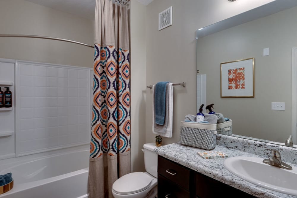 Bathroom with bathtub at Parc at Broad River | Apartments in Beaufort, South Carolina