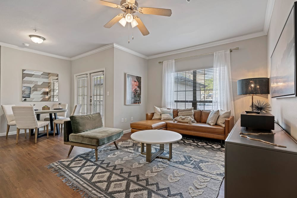 Furnished apartment living room and dining room atMarquis Parkside in Austin, Texas