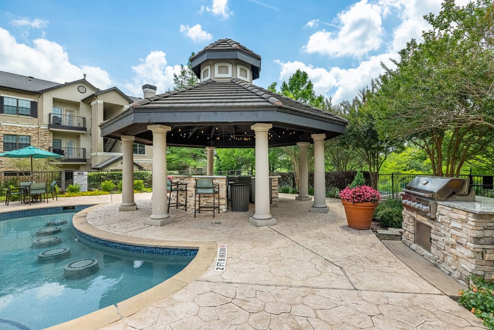 Resort-Style Swimming Pool with Swim-Up Bar at Marquis Parkside in Austin, Texas