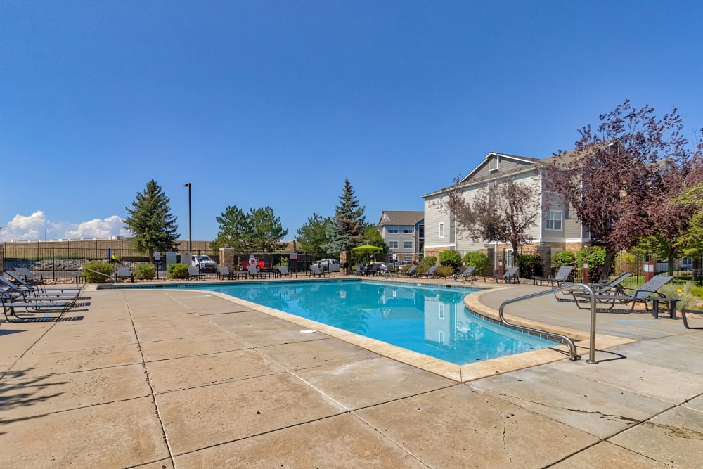Community pool with large pool deck space at Reserve at South Creek in Englewood, Colorado