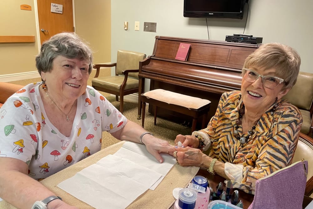Residents having their nails done at The Columbia Presbyterian Community in Lexington, South Carolina