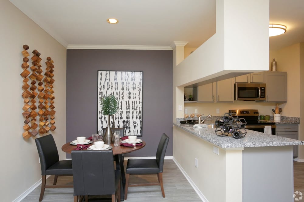 Kitchen and dining area at The Columns at Westchase in Houston, Texas