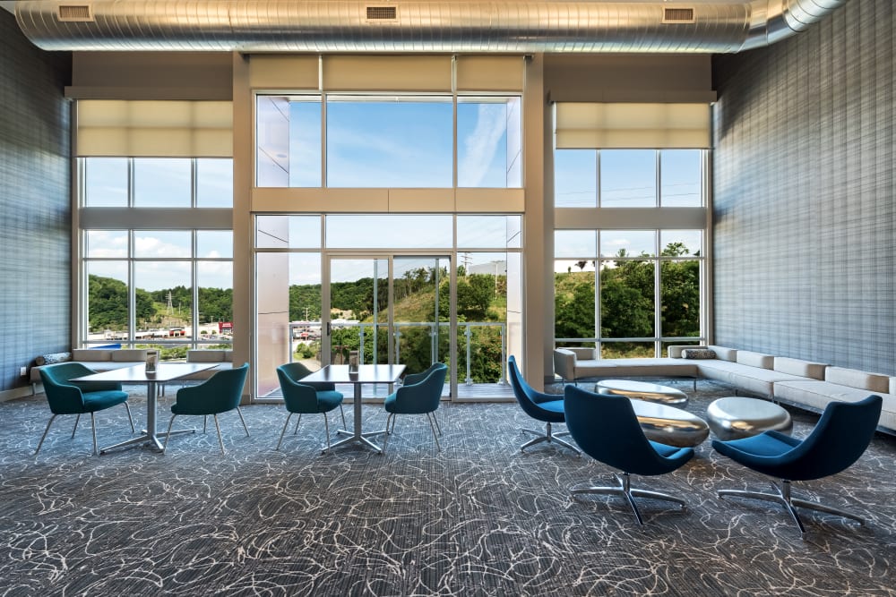 Meeting room with lots of seating at Cosmopolitan Apartments in Pittsburgh, Pennsylvania