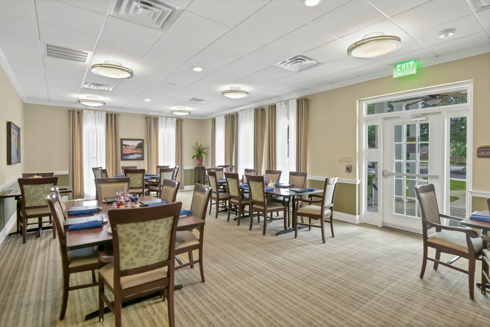 Dining room with outdoor access at The Florence Presbyterian Community in Florence, South Carolina