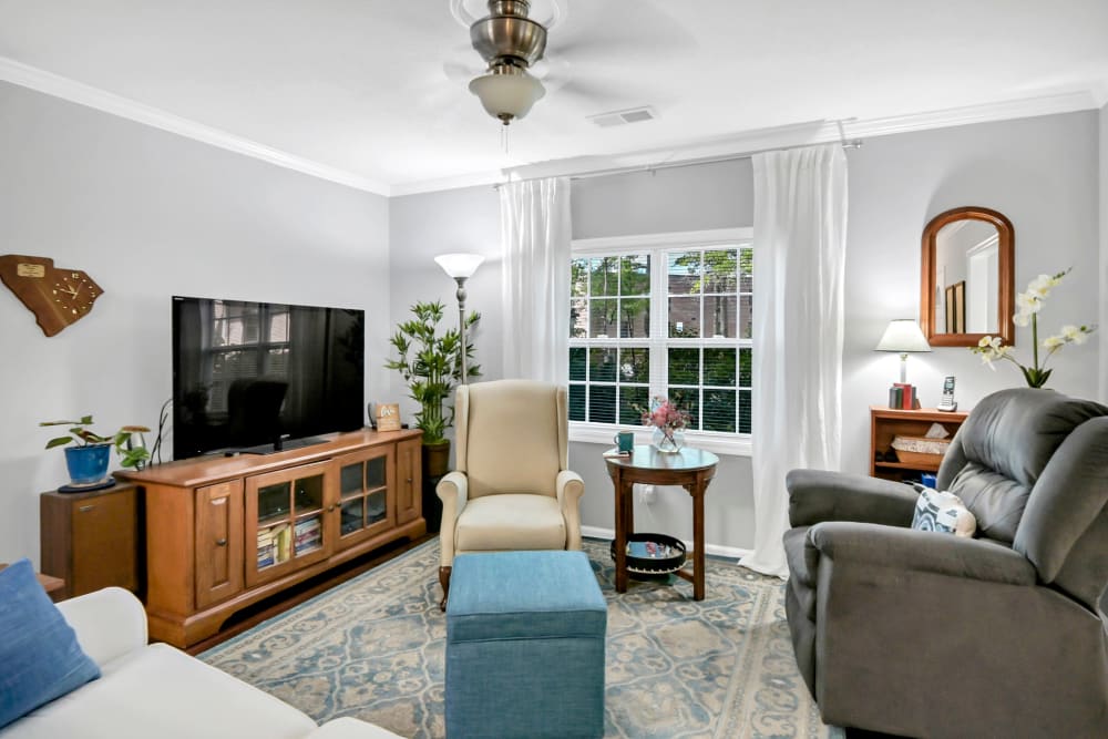 Furnished model living room at The Village at Summerville in Summerville, South Carolina