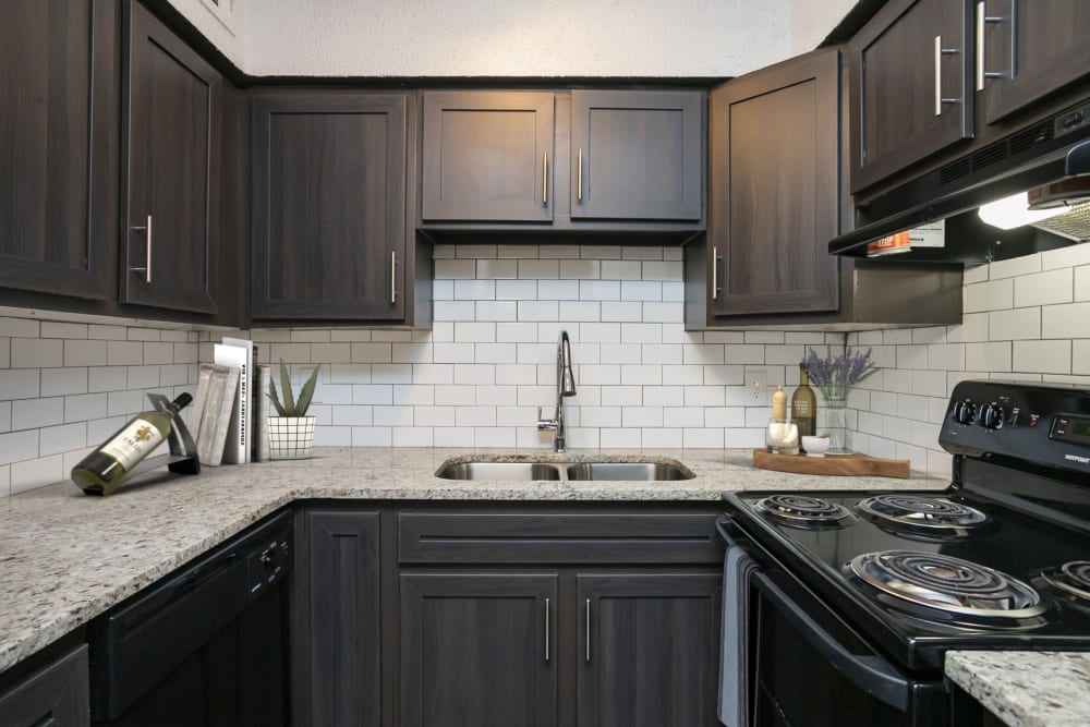 Fully-equipped modern kitchen at Magnolia Place Apartments in Franklin, Tennessee