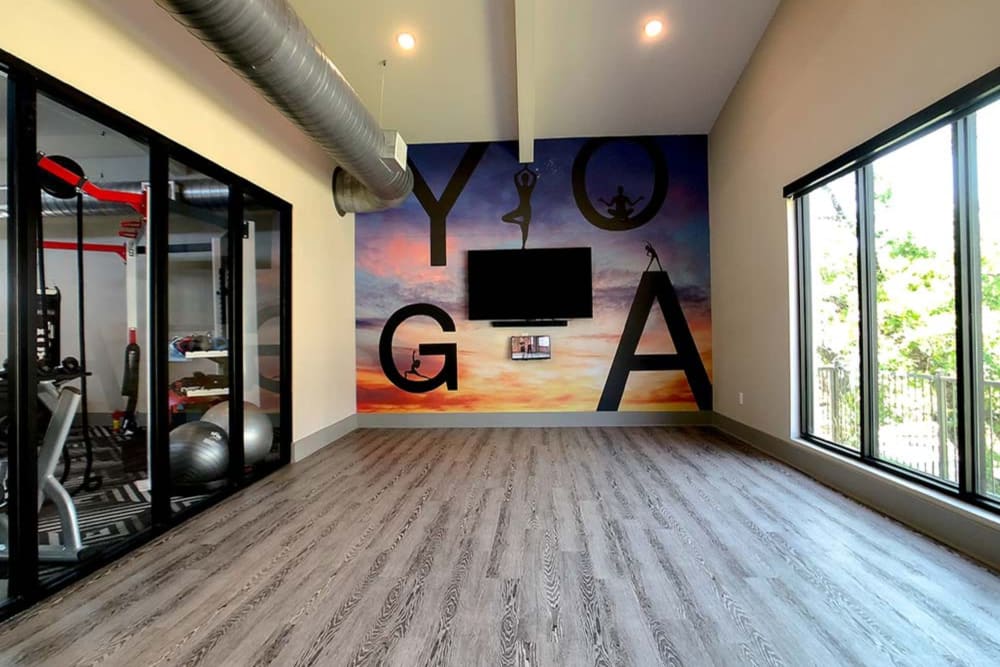 Yoga room with hardwood floors at The View at Crown Ridge in San Antonio, Texas