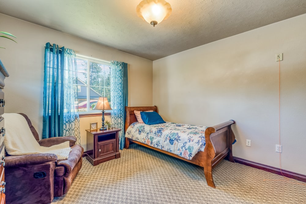 Bedroom at Pacifica Senior Living Pinehurst in Pinehurst, Idaho