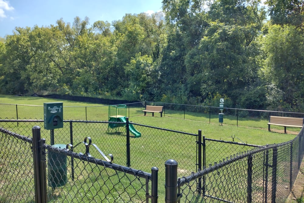 Playground featuring a slide at Pebble Creek Apartments in Antioch, Tennessee