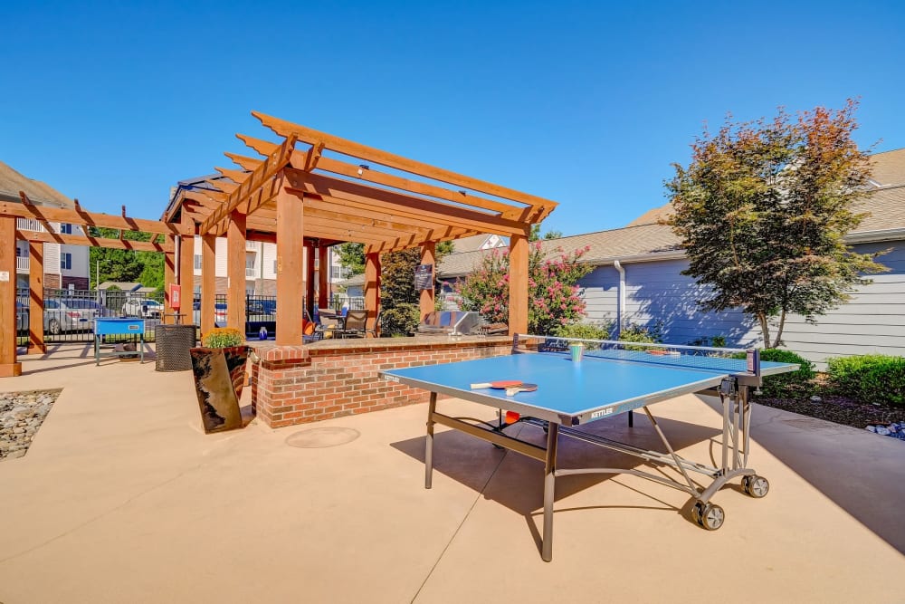 Outside pool lounge area at Carden Place Apartment Homes in Mebane, North Carolina
