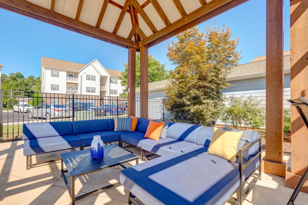 Outdoor patio lounge area at Carden Place Apartment Homes in Mebane, North Carolina