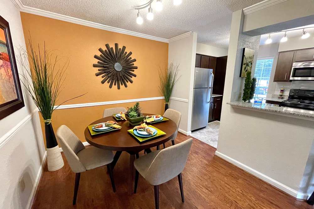 Dining room with table for two at The Abbey at Inverness in Birmingham, Alabama