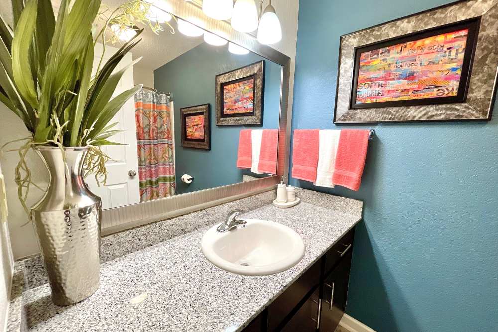 Bathroom with large vanity at The Abbey at Inverness in Birmingham, Alabama