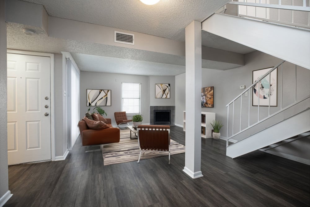 Spacious apartment with wood-style flooring at The Clara in San Antonio, Texas