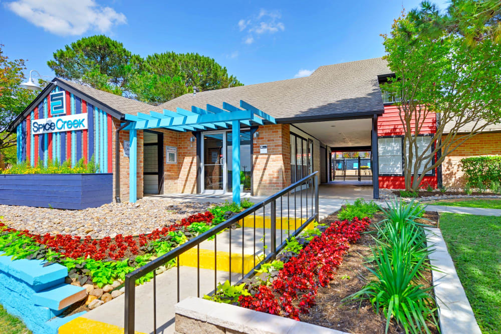 Colorful exterior of clubhouse at Spice Creek in San Antonio, Texas