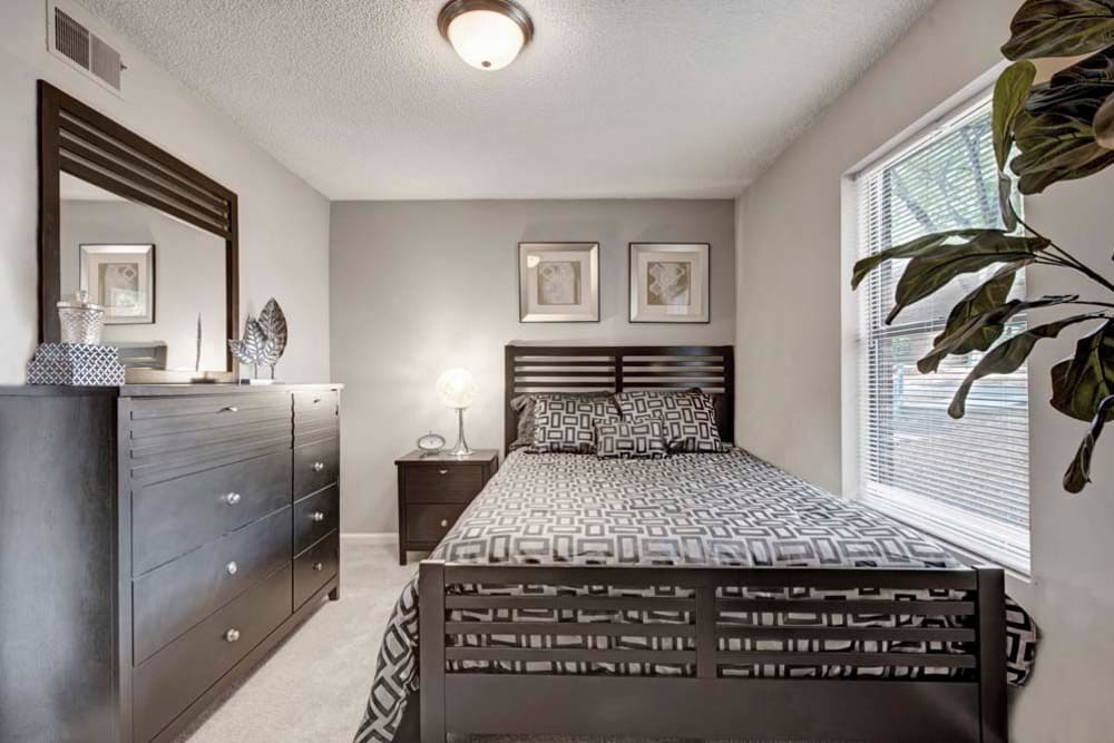 Cozy bedroom at Mill Creek Flats in Winston Salem, North Carolina