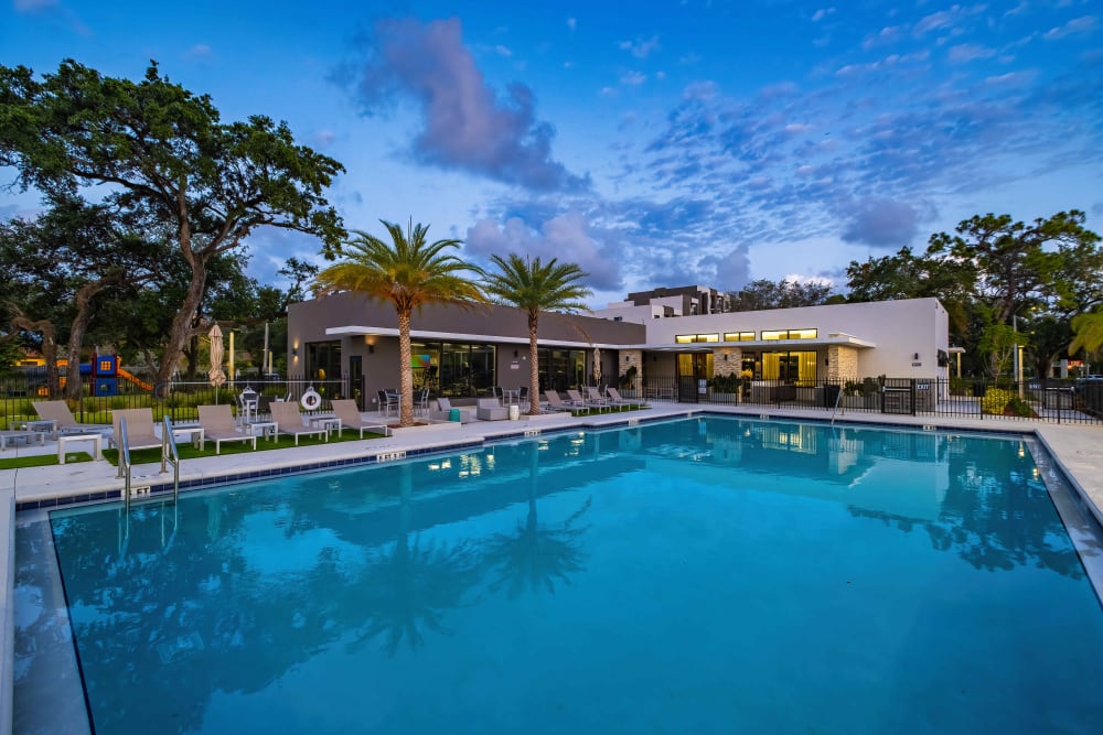 Swimming pool and building at Oak Enclave in Miami Gardens, Florida