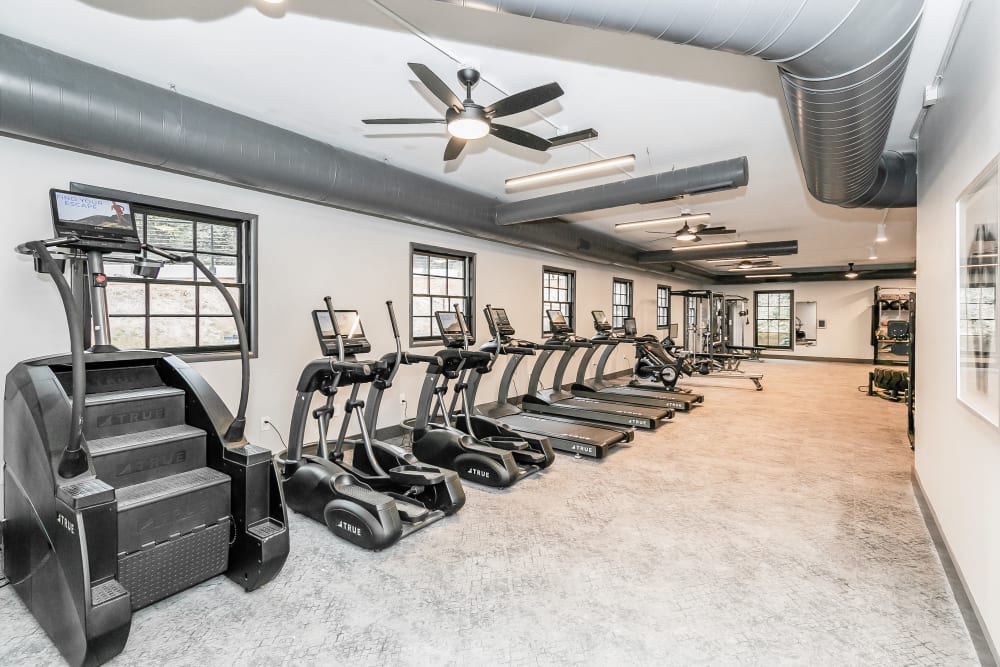 24 hour fitness center at Newnan Lofts Apartment Homes in Newnan, Georgia