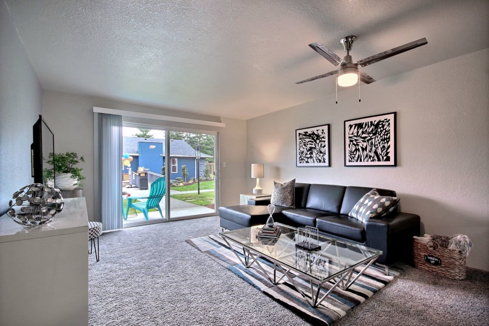 Living room with nice patio area at Nova North in Everett, Washington