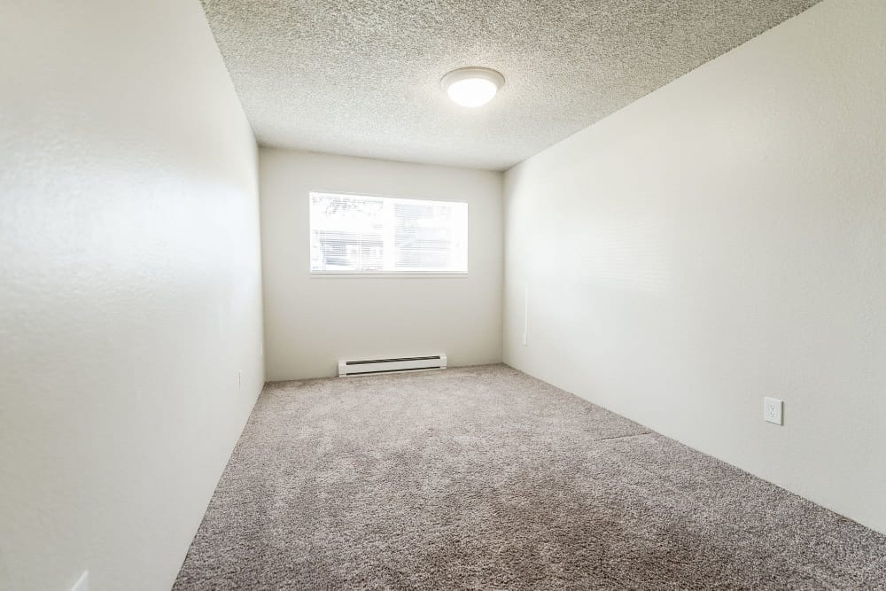 Bedroom with nice carpeting at Nova North in Everett, Washington