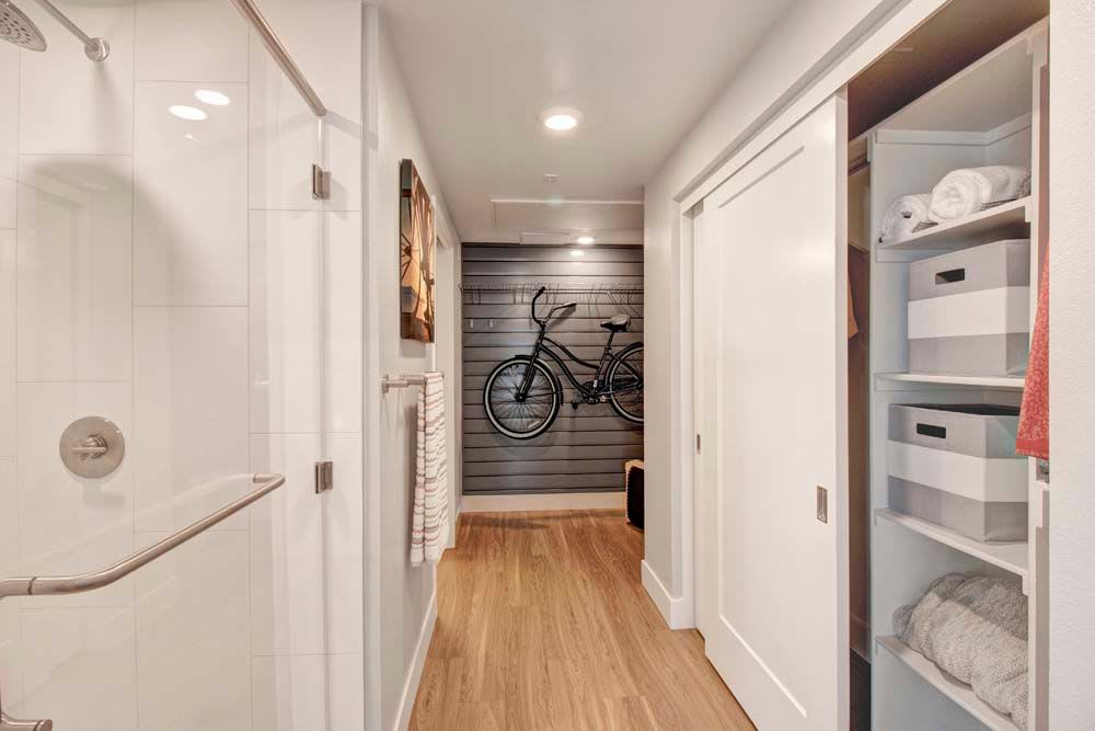Mini hallway with bike displayed on the wall in Long Beach, California
