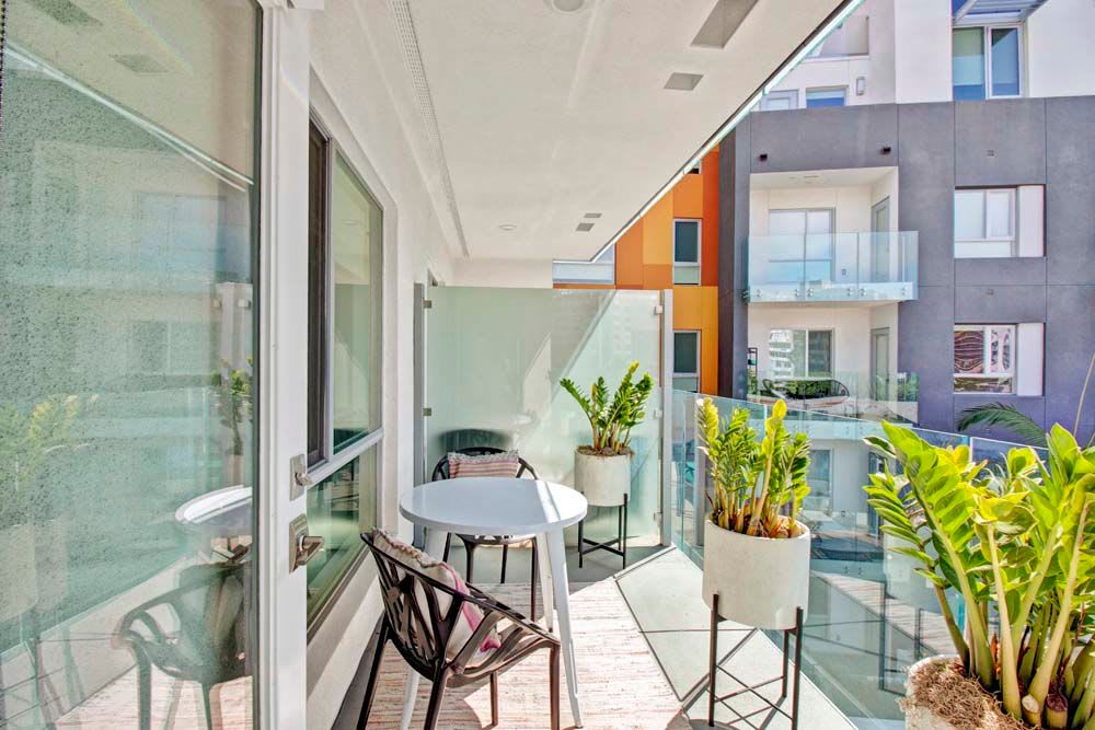 Balcony with small coffee table and chair at  Long Beach, California