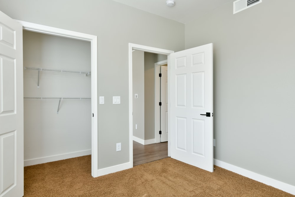 Bedroom with large closet at Emerald Park Apartment Homes in Dublin, California