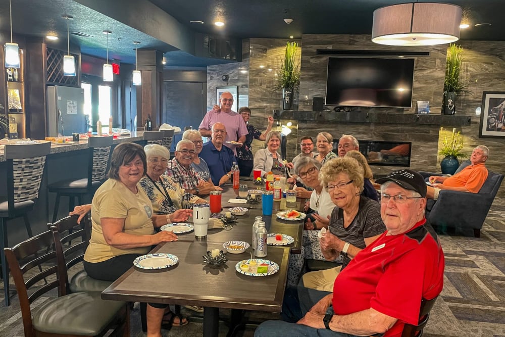 Group of residents out at a restaurant at Attivo Trail in Ames, Iowa