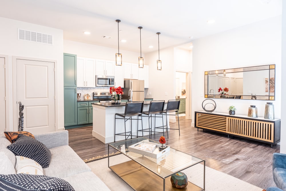 Kitchen leading into living space at The Everett at Ally Village in Midland, Texas