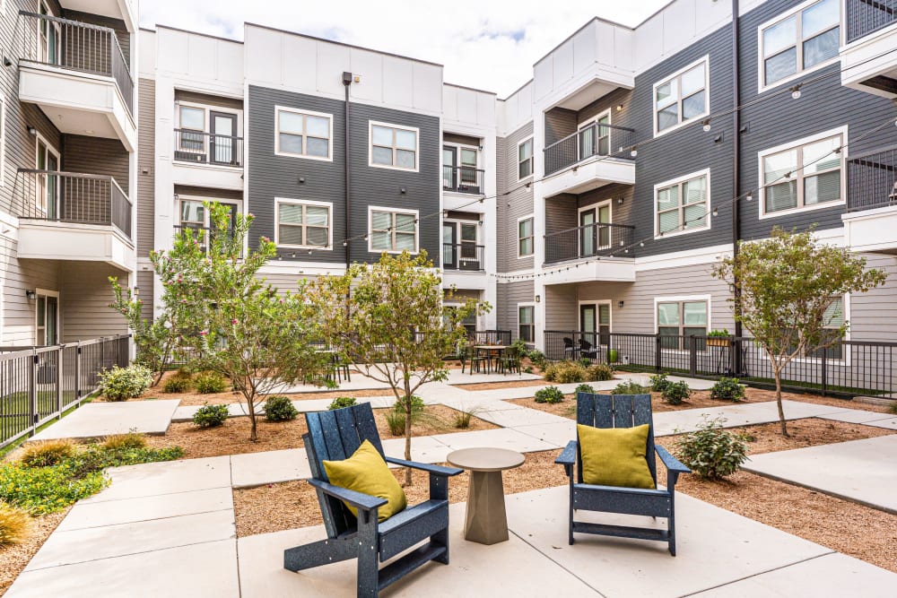 Courtyard area with seating at The Everett at Ally Village in Midland, Texas