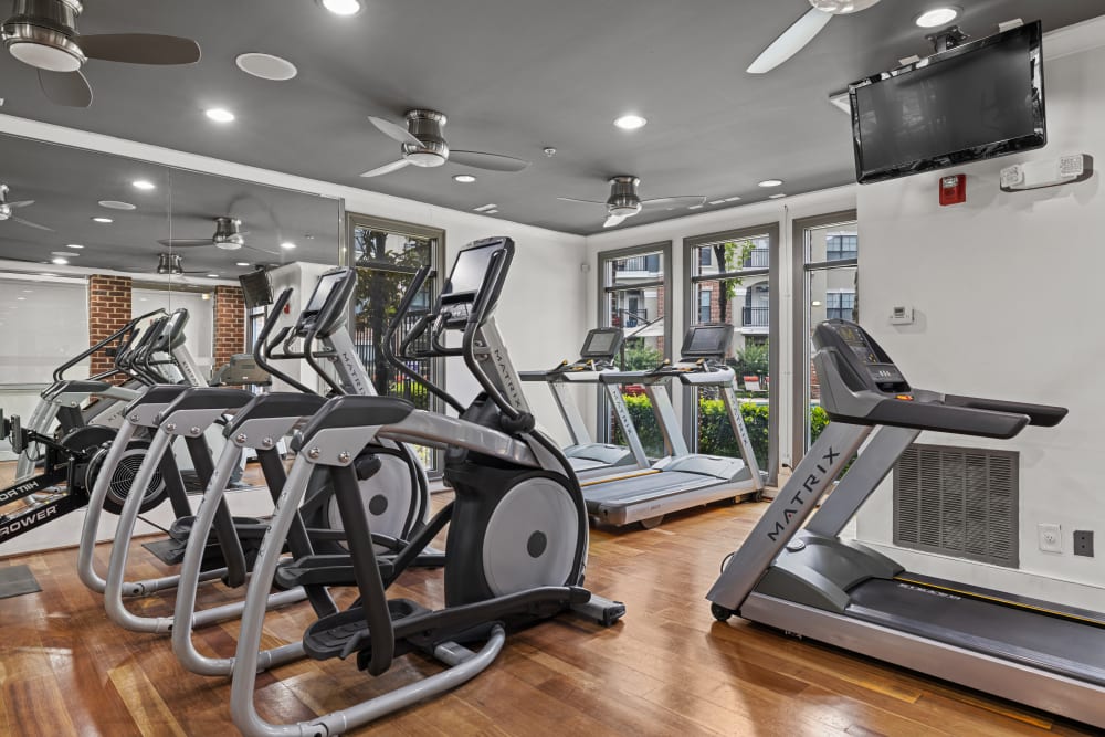 Fitness center with cardio equipment at Marquis Midtown District in Atlanta, Georgia