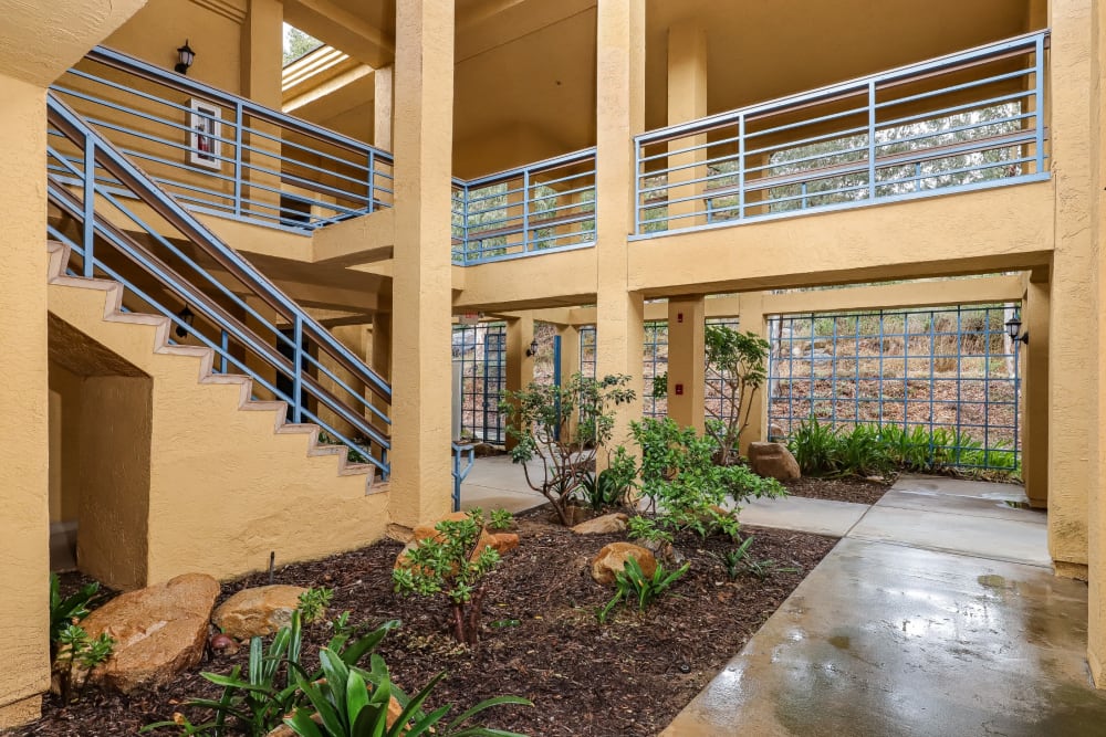 Outdoor gardens and staircase at Pacifica Senior Living Poway in Poway, California