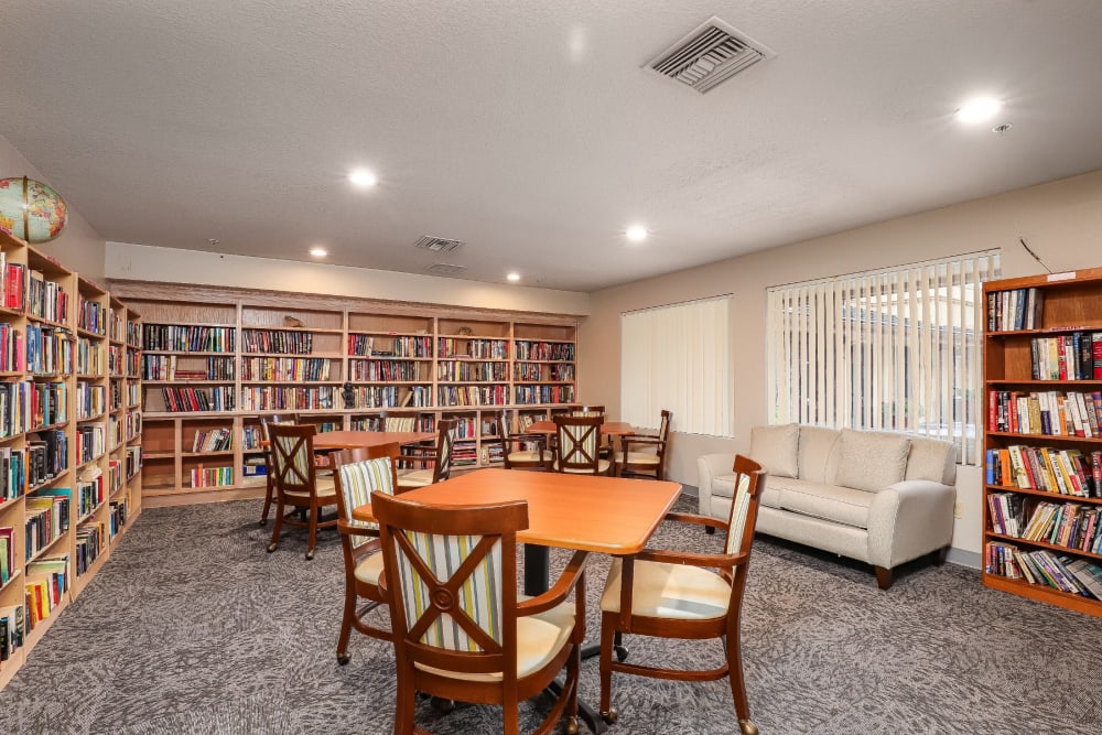 Resident library with seating at Pacifica Senior Living Poway in Poway, California