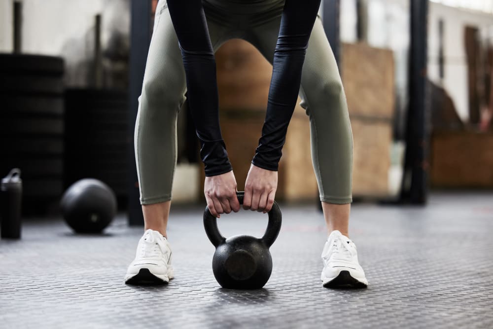 Resident lifting weights at Lehigh Square in Allentown, Pennsylvania